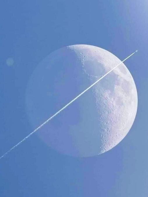 Airplane passes through the moon-Stumbit Cute Images